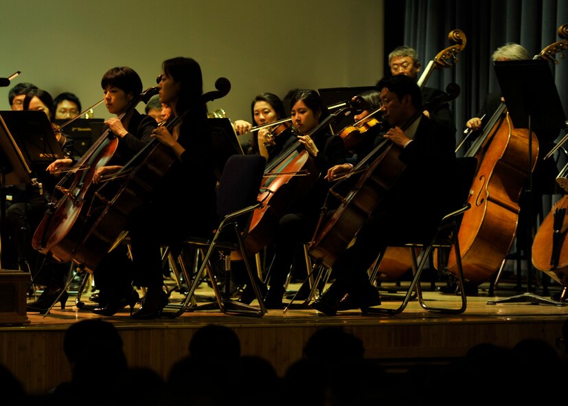 Members of the Gyeonggi Philharmonic Orchestra perform at the base theater on Osan Air Base, Republic of Korea, May 31, 2013. The concert was free and open to all Osan members. (U.S. Air Force photo/Senior Airman Siuta B. Ika)