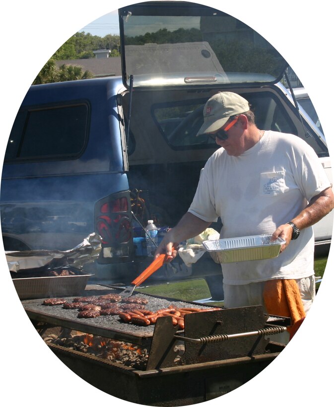 Jeff Fersner has had an interesting two years. This cost engineer has endured some tough times but has thrived. Here, Jeff grills some food at our annual Corps Day.