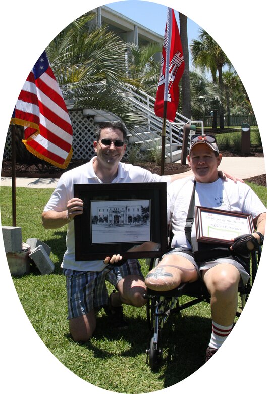 Jeff Fersner has had an interesting two years. This cost engineer has endured some tough times but has thrived. Here, Jeff receives the Employee of the Month award for his efforts as the only cost engineer in the building.