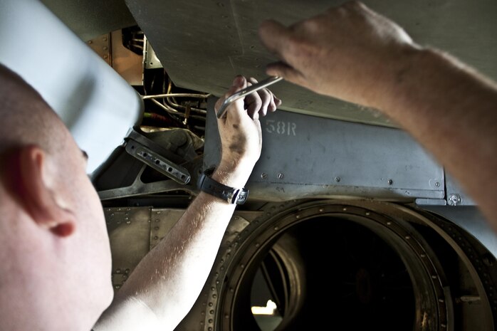 Lance Cpl. Adam Duvall, Marine Attack Squadron 513 aviation technician, works on an F/A-18 inside a hangar here, April 5, 2013. VMA-513 joined Marine Aircraft Group 12 March 20, 2013. The Nightmares are participating in Foal Eagle in Korea for the remainder of April and will then head back to Marine Corps Air Station
Yuma, Ariz.