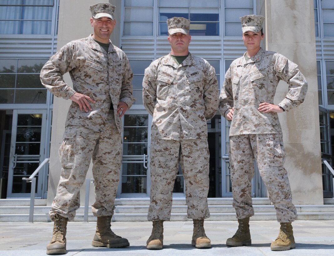 From left, Warrant Officer Andrew DuRivage, Warrant Officer Christopher Johnson and Warrant Officer Crystal Black stand in front of Little Hall, where they graduated The Basic School’s Warrant Officer Basic Course on May 22. 