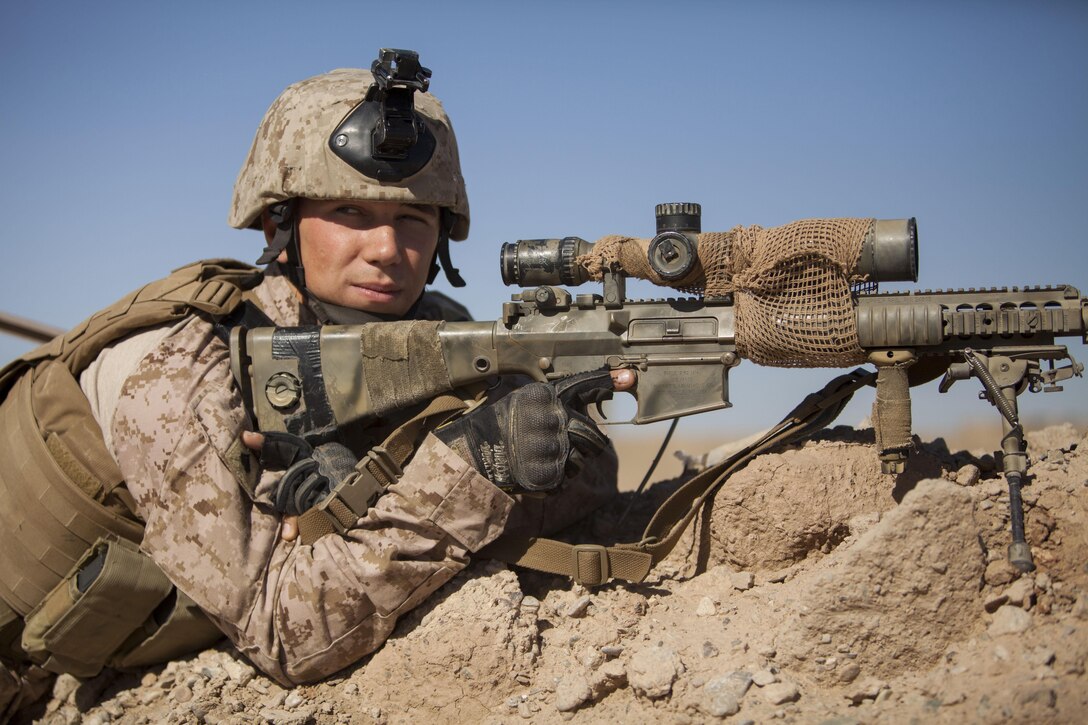 U.S. Marine Corps Cpl. Gaven Eier, a scout sniper with Fox Company, 2nd Battalion, 8th Marines (2/8), Regimental Combat Team 7, provides security during a mission rehearsal on Camp Bastion, Afghanistan, May 28, 2013. The Marines and Sailors of 2/8 conducted the rehearsal in preparation for a partnered operation with their Afghan National Army counterparts. (U.S. Marine Corps photo by Kowshon Ye/Released)