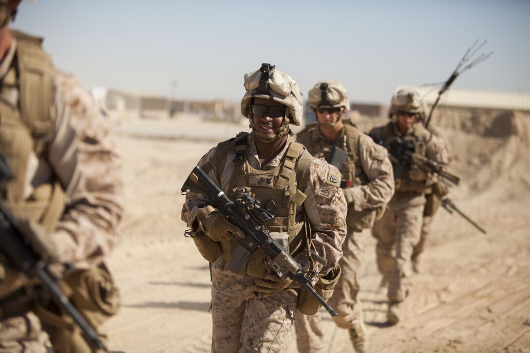 U.S. Navy Petty Officer 2nd Class Branden Johnson, a hospital corpsman with Fox Company, 2nd Battalion, 8th Marines (2/8), Regimental Combat Team 7, conducts a mission rehearsal on Camp Bastion, Afghanistan, May 28, 2013. The Marines and Sailors of 2/8 conducted the rehearsal in preparation for a partnered operation with their Afghan National Army counterparts. (U.S. Marine Corps photo by Kowshon Ye/Released)