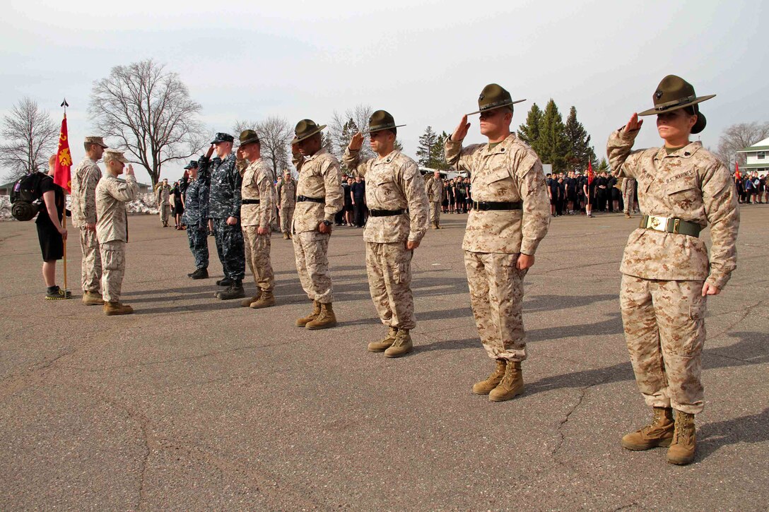 Drill instructors and corpsmen who participated in Recruiting Station Twin Cities' three-day mini boot camp received a meritorious mast for their efforts during the closing ceremony April 28. More than 650 aspiring Marines and guests attended the event. For additional imagery from the event, visit www.facebook.com/rstwincities. 