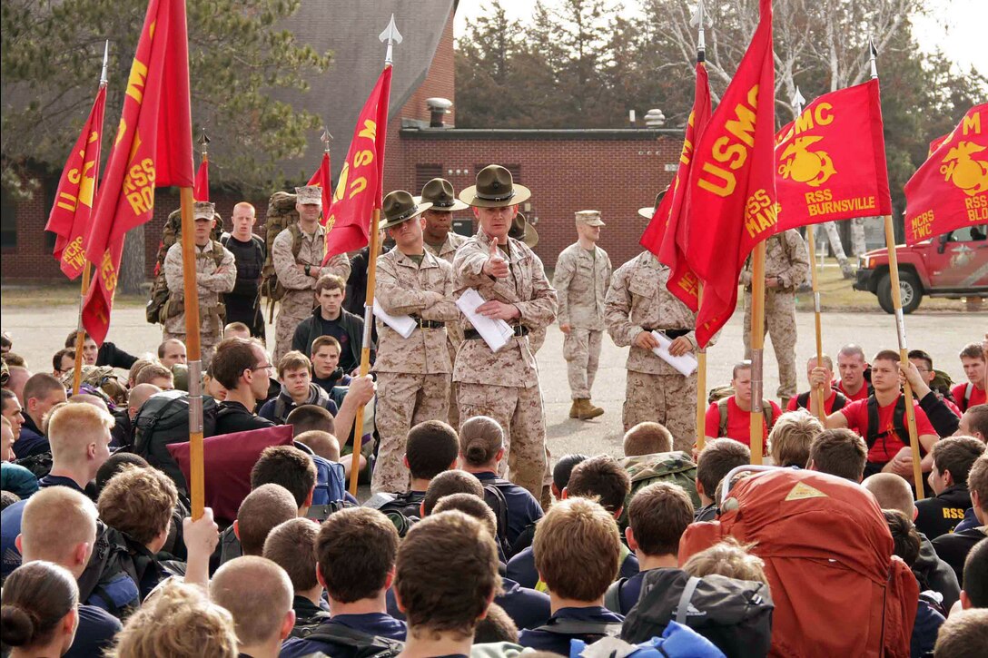 Drill instructors answer questions about recruiting training after Recruiting Station Twin Cities' mini boot camp closing ceremony April 28. More than 650 aspiring Marines and guests attended the event. For additional imagery from the event, visit www.facebook.com/rstwincities.