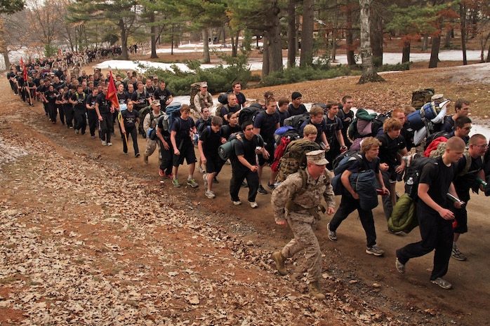 Recruiting Substation Mankato passes the halfway point of a five-mile hike with weighted packs during Recruiting Station Twin Cities' mini boot camp April 28. The hike initially started out as a 3.5-mile exercise, but extended due to the lack of people falling out. For additional imagery from the event, visit www.facebook.com/rstwincities.