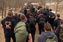 Nearly 800 Recruiting Station Twin Cities' mini boot camp participants and coordinators near the end of a five-mile hike with weighted packs April 28. The hike initially started out as a 3.5-mile exercise, but extended due to the lack of people falling out. For additional imagery from the event, visit www.facebook.com/rstwincities.