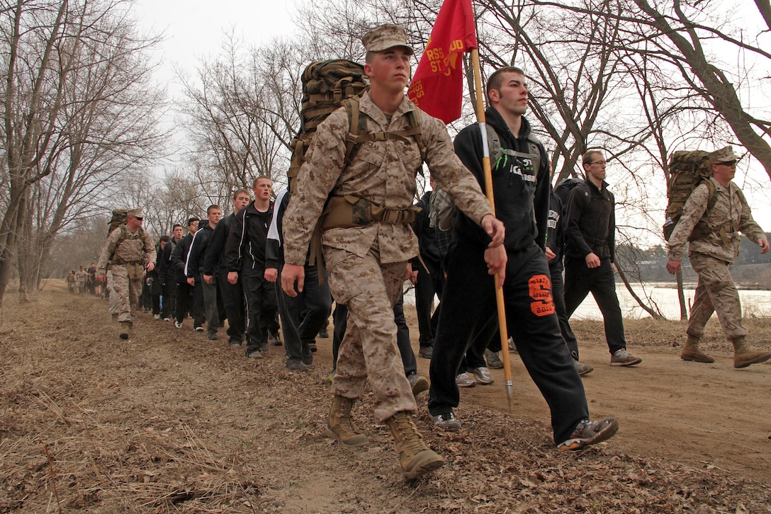 Recruiting Substation St. Cloud reaches mile two of a five-mile hike with weighted packs during Recruiting Station Twin Cities' mini boot camp April 28. The hike initially started out as a 3.5-mile exercise, but extended due to the lack of people falling out. For additional imagery from the event, visit www.facebook.com/rstwincities.