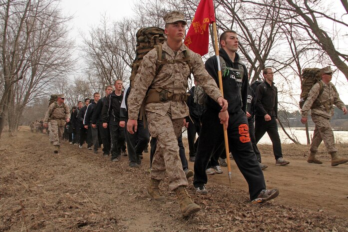 Recruiting Substation St. Cloud reaches mile two of a five-mile hike with weighted packs during Recruiting Station Twin Cities' mini boot camp April 28. The hike initially started out as a 3.5-mile exercise, but extended due to the lack of people falling out. For additional imagery from the event, visit www.facebook.com/rstwincities.