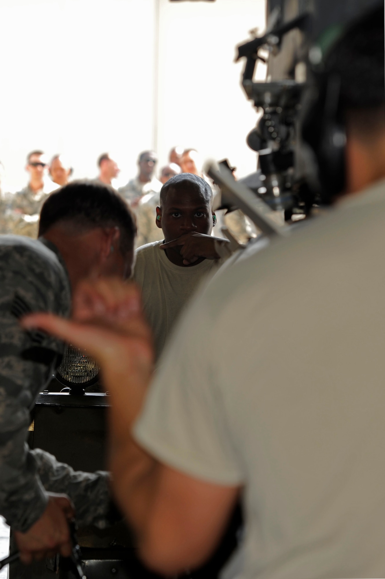 KUNSAN AIR BASE, Republic of Korea – 80th Aircraft Maintenance Unit crew chiefs, Senior Airman’s Damon Bryant, center, and Enrique Melgarejo, right, uses hand signals while loading a GBU- 31 version 1 Joint Direct Attack Munition, as Staff Sgt. Jonathan Oliver, left, unhooks a strap during a load crew competition at Kunsan Air Base Republic of Korea, May 23, 2013. Each team had to load one GBU- 31 version 1 JDAM, and one AIM-9X Sidewinder. (U.S. Air Force photo by Staff Sgt. Tong Duong/ Released) 