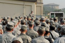 Col. S. Clinton Hinote, 8th Fighter Wing commander, addresses the Airmen about the goals and expectations he has for them while at Kunsan Air Base, Republic of Korea, May 23, 2013. One of Hinote’s goals for the Wolf Pack is to work closer with the Republic of Korea air force while at Kunsan. (U.S. Air Force photo by Senior Airman Marcus Morris/Released)
