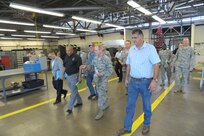 U.S. Air Force Brig. Gen. Robert D. LaBrutta, 502nd Air Base Wing and Joint Base San Antonio commander, tours the 502nd Civil Engineer Squadron Facility June 3, at JBSA-Fort Sam Houston. LaBrutta will visit the three primary JBSA locations this week.  He took command during a ceremony May 29. (U.S. Air Force photo by Joel Martinez/Released) 