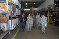 Air Force Brig. Gen. Robert D. LaBrutta, Joint Base San Antonio and 502nd Air Base Wing commander, tours the Central Issue Facility June 3, at JBSA-Fort Sam Houston. LaBrutta will visit the three primary JBSA locations this week.  He took command during a ceremony May 29. (U.S. Air Force photo by Joel Martinez/Released) 
