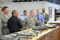 Air Force Brig. Gen. Robert D. LaBrutta, Joint Base San Antonio and 502nd Air Base Wing commander, tours the Central Issue Facility June 3, at JBSA-Fort Sam Houston. LaBrutta will visit the three primary JBSA locations this week.  He took command during a ceremony May 29. (U.S. Air Force photo by Joel Martinez/Released) 