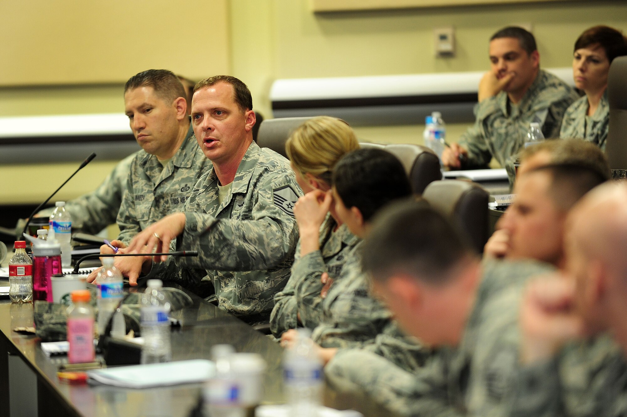 National Capital Region NCOs participate in an open discussion during the 2013 Ultimate First Sergeant Seminar, May 23, 2013, at Joint Base Andrews, Md. The four-day seminar was open to National Capital Region Airmen and service members of any military branch in the grade of E6-E8. (U.S. Air Force photo by Senior Airman Steele C. G. Britton)
