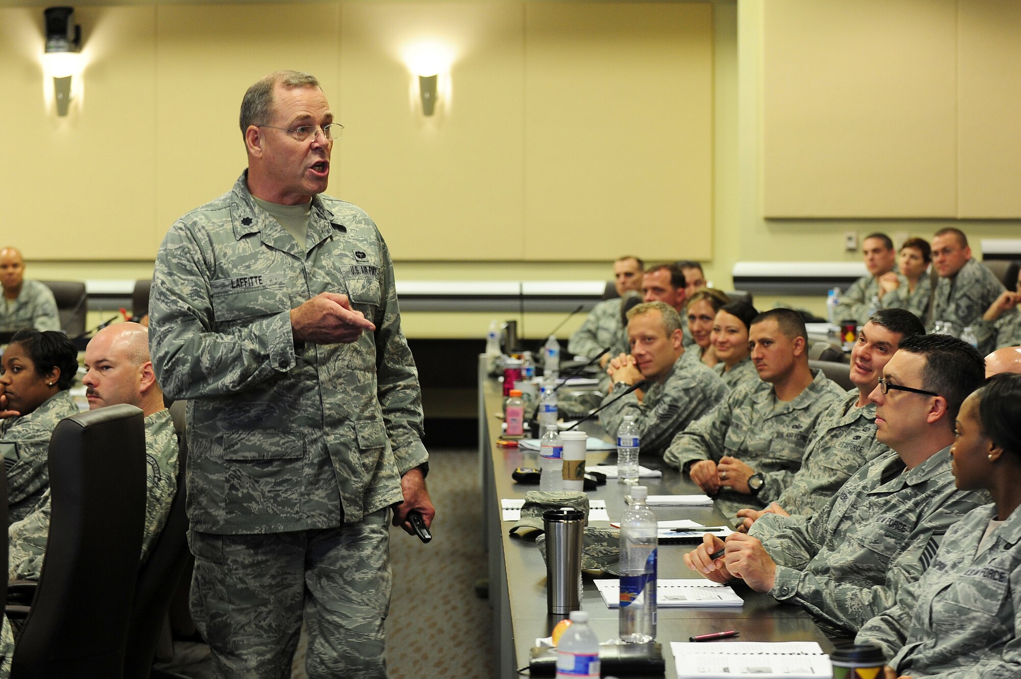 Lt. Col. Gregory Laffitte, Headquarters Air Force Manpower and Personnel Comprehensive Airman Fitness Branch chief, briefs NCOs about building a culture to sustain resilient Airmen during the 2013 Ultimate First Sergeant Seminar, May 23, 2013, at Joint Base Andrews, Md. The seminar was a chance for NCOs to "step into the blue" to learn tools and experience how to make a positive difference in Airmen's lives, according to Senior Master Sgt. Johnny L. Hamm, Air Force District of Washington first sergeant. (U.S. Air Force photo by Senior Airman Steele C. G. Britton)