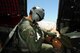 A California Air National Guardsman assigned to the 130th Rescue Squadron conduct container ramp load (CRL) training in an MC-130P Combat Shadow cargo aircraft over Moffett Federal Airfield, Calif., June 2, 2013. The CRL training simulates equipment drops and is conducted every six months. (U.S. California Air National Guard photo by Staff Sgt. Kim E. Ramirez)
