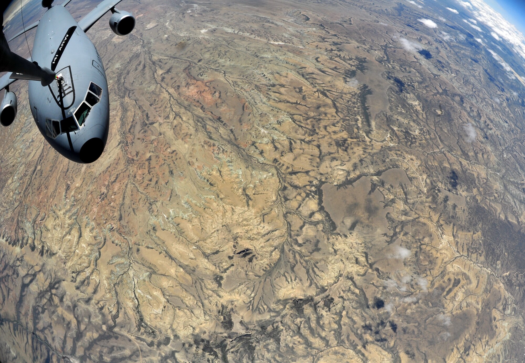 A KC-135 Stratotanker from Fairchild Air Force Base refuels a KC-10 Extender from Travis Air Force Base during an air refueling above Western United States, May 31, 2013. The air refueling was part of a quarterly exercise called Advanced Combat Operations Training. (U.S. Air Force photo by Senior Airman Taylor Curry/Released)
