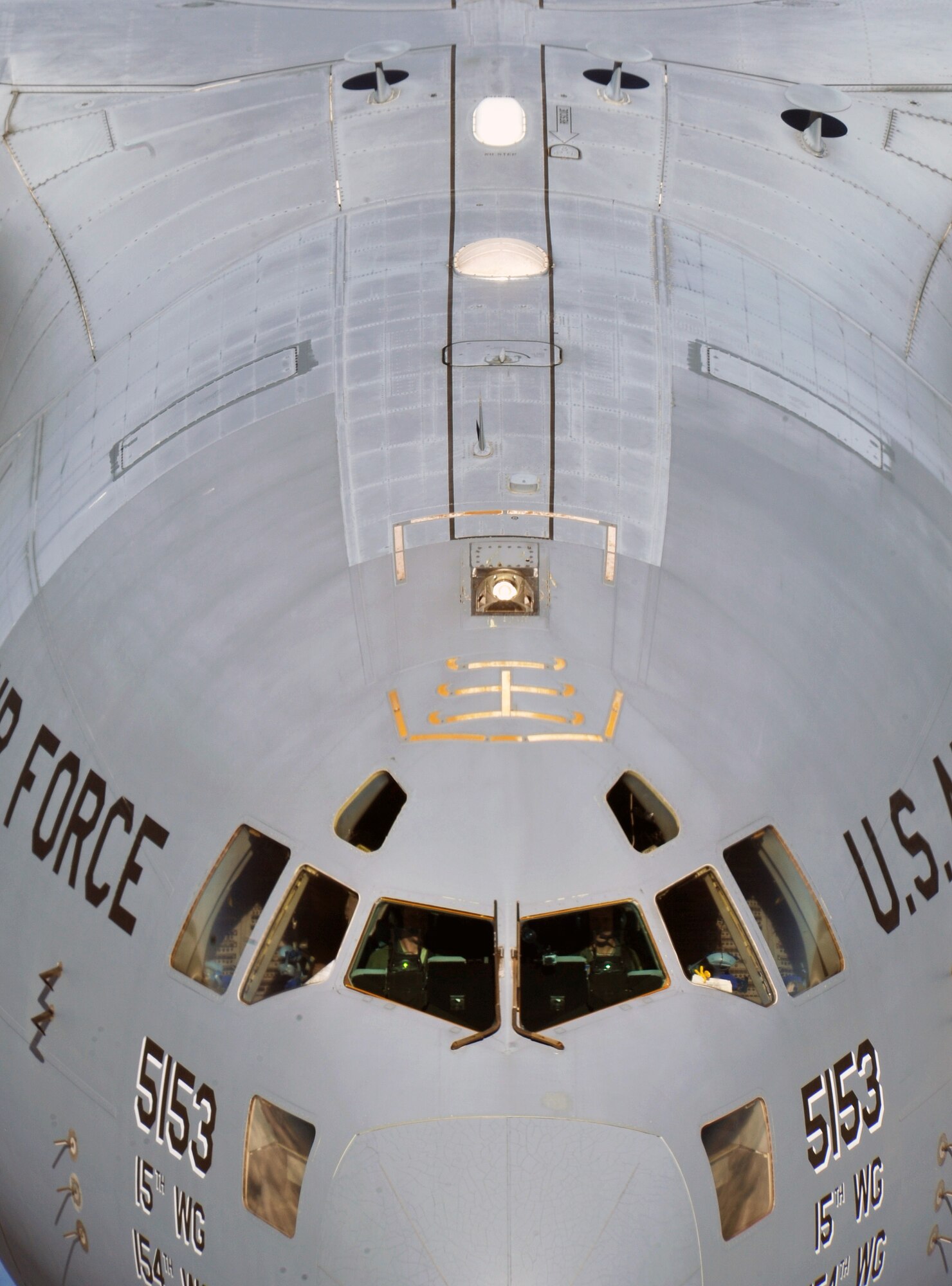 A close up of a C-17 Globemaster III from Joint Base Lewis/McChord approaching a KC-135 Stratotanker from Fairchild Air Force Base during an air refueling above Western United States, May 31, 2013. The air refueling was part of a quarterly exercise called Advanced Combat Operations Training. (U.S. Air Force photo by Senior Airman Taylor Curry/Released)