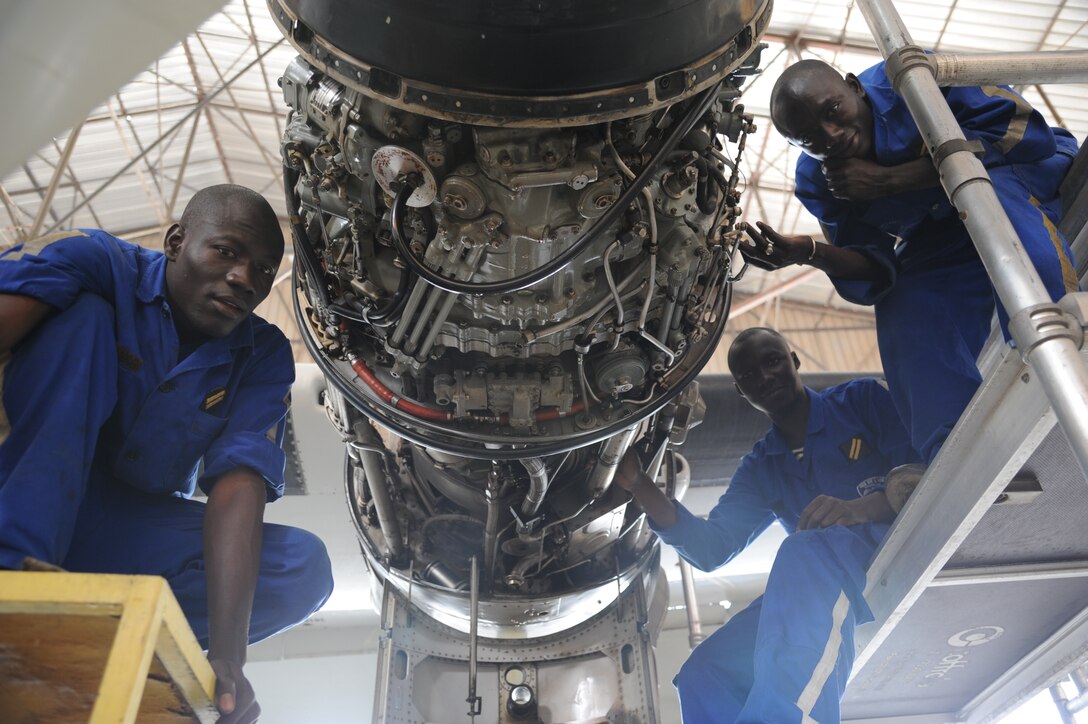 Members of the Senegalese Air Force take a break while performing maintenance on one of their aircraft, during an engagement with the 621st Contingency Response Wing.  (U.S. Air Force photo by Capt. Brooke Brzozowske)