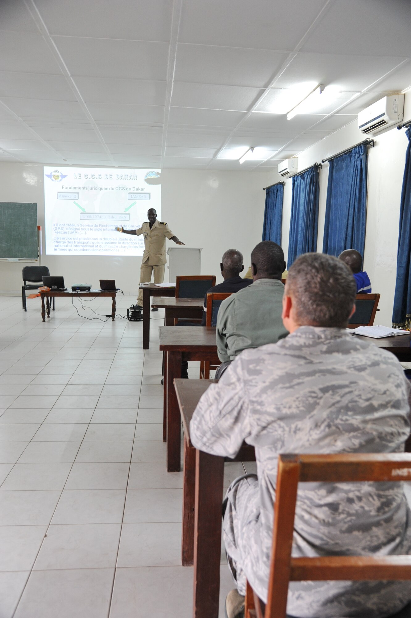 Lt. Col. William Neitzke, 818th Mobility Support Advisory Squadron team lead, sits in on a discussion about Senegalese search and rescue tactics, May 24, 2013.  (U.S. Air Force photo by Capt. Brooke Brzozowske)