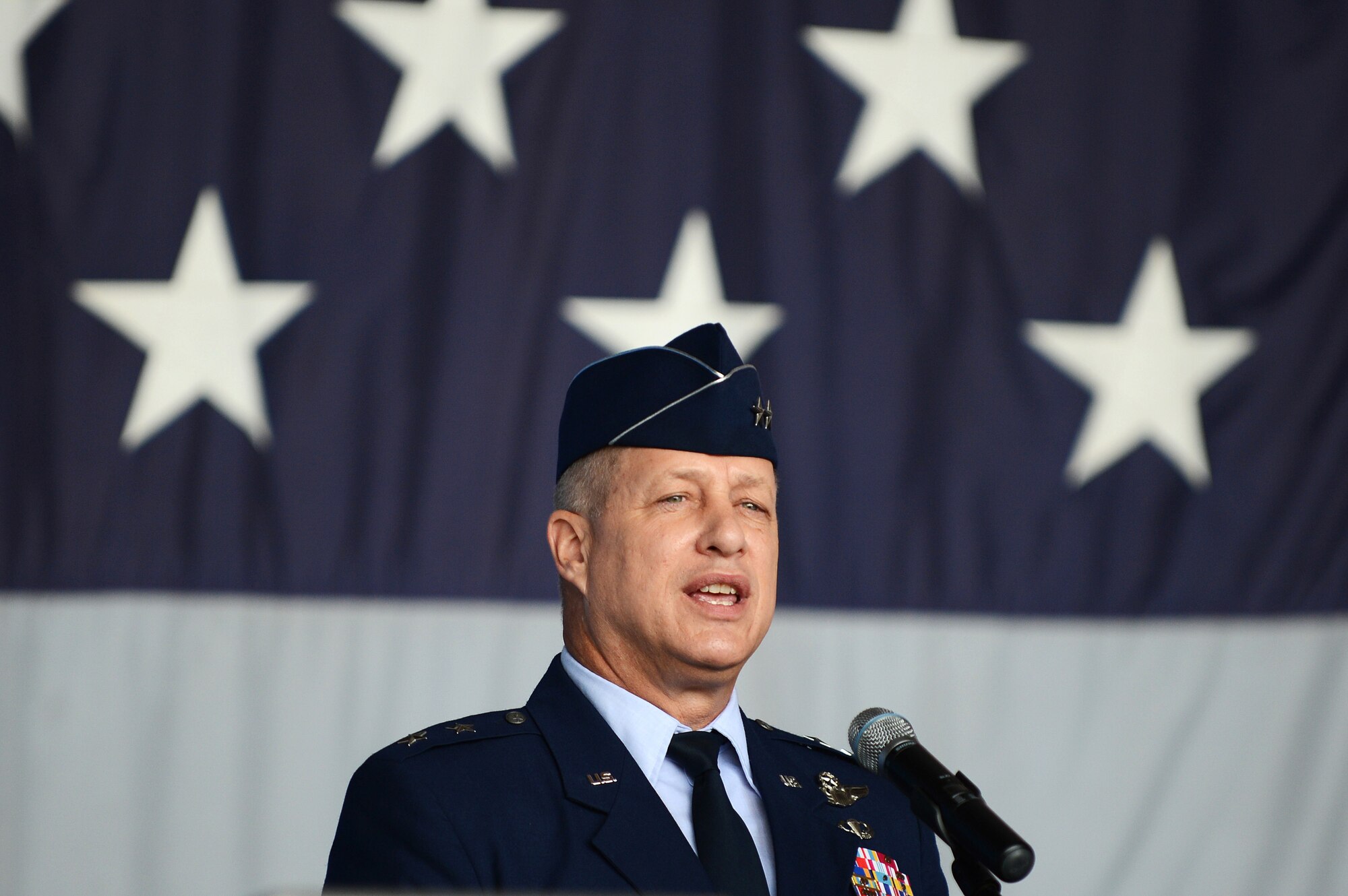 Maj. Gen. Lawrence Wells speaks during his change of command and retirement ceremony at Shaw Air Force Base, S.C., May 31, 2013. Wells thanked all those who supported him and his family throughout his 35-year career during his speech. (U.S. Air Force photo by Airman 1st Class Daniel Blackwell/Released)