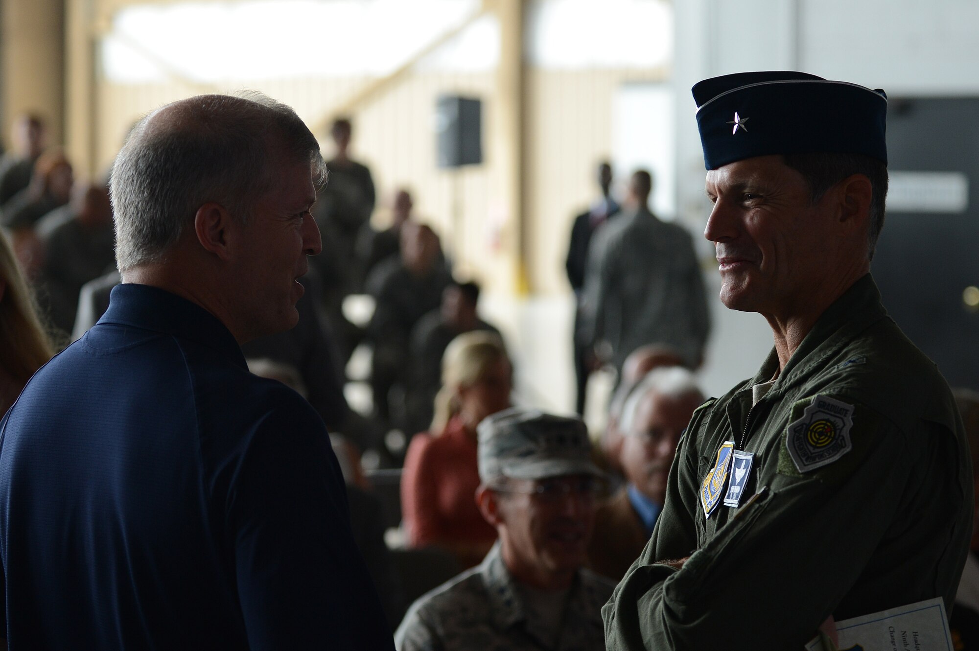Brig. Gen. Rob Polumbo, 7th Air Force mobilization assistant to the commander, attends his brothers change of command ceremony at Shaw Air Force Base, S.C., May 31, 2013. Maj. Gen. Jake Polumbo took command of 9th Air Force from Maj. Gen. Lawrence Wells 9th. Wells retired after 35 years of active duty service in the United States Air Force. (U.S. Air Force photo by Airman 1st Class Daniel Blackwell/Released)
