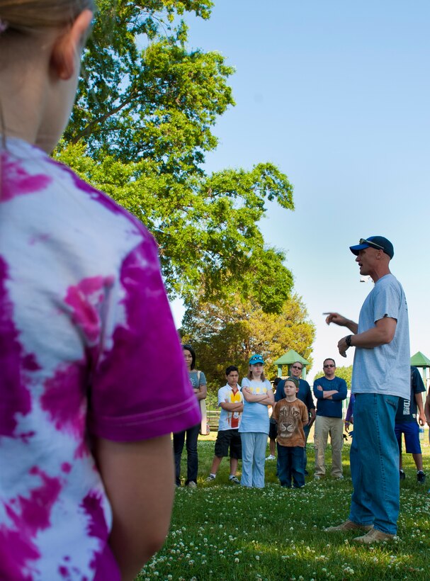 U.S. Air Force Lt. Col. Dee Jay Katzer, 633rd Civil Engineer Squadron commander, thanks volunteers during Clean the Bay Day at Langley Air Force Base, Va., June 1, 2013. The annual event helps keep the Chesapeake Bay clean. (U.S. Air Force photo by Airman 1st Class Kimberly Nagle/Released) 