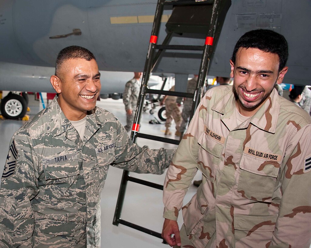 Chief Master Sgt. Gerardo Tapia, Command Chief, Air Education and Training
Command, talks with an airman from the Royal Saudi Air Force during his
visit to Sheppard Air Force Base, Texas, May 30, 2013. Tapia, along with AETC commander Gen. Edward A. Rice, visited the base for an in-depth look at training May 30-31. (U.S. Air Force Photo/Danny Webb)

