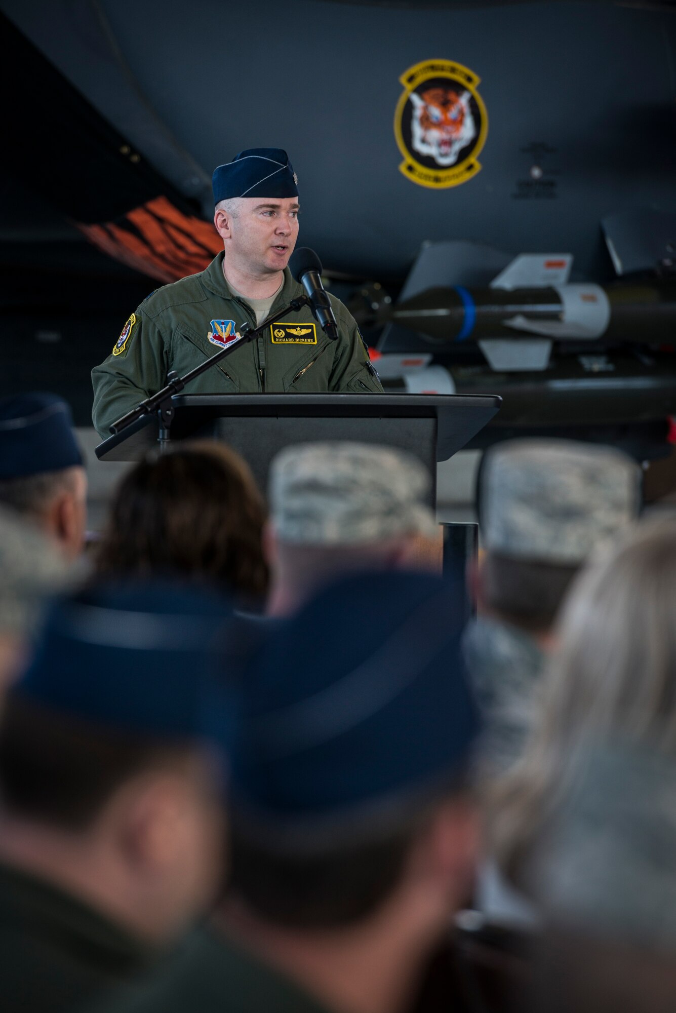 U.S. Air Force Lt. Col. Richard Dickens speaks to the 391st Fighter Squadron as he takes his new position as its commander, May 23, 2013 at Mountain Home Air Force Base, Idaho. Dickens complimented the squadron on its accomplishments under its former commander, Lt. Col. David Brynteson, and talked about carrying the squadron's legacy forward. (U.S. Air Force Photo by Tech. Sgt. Samuel Morse)(Released)