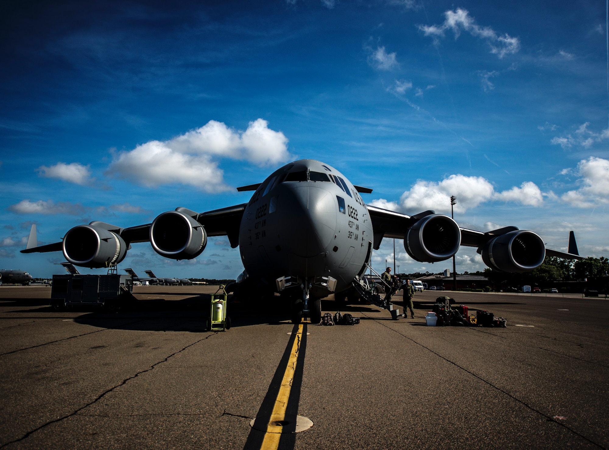 A new C-17 Globemaster III, piloted by Lt. Gen. Robert Allardice, Air Mobility Command vice commander, is delivered  May 30, 2013, to Joint Base Charleston – Air Base, S.C. Joint Base Charleston is scheduled to receive the final C-17 later this year, as Boeing completes work on the Air Force’s last Globemaster. The first C-17 to enter the Air Force’s inventory arrived at Charleston Air Force Base in June 1993. The C-17 is capable of rapid strategic delivery of troops and all types of cargo to main operating bases or directly to forward bases in the deployment area. (U.S. Air Force photo/Senior Airman Dennis Sloan)