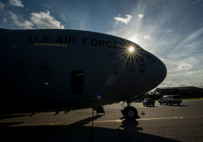A new C-17 Globemaster III, piloted by Lt. Gen. Robert Allardice, Air Mobility Command vice commander, is delivered May 30, 2013, to Joint Base Charleston – Air Base, S.C. Joint Base Charleston is scheduled to receive the final C-17 later this year, as Boeing completes work on the Air Force’s last Globemaster. The first C-17 to enter the Air Force’s inventory arrived at Charleston Air Force Base in June 1993. The C-17 is capable of rapid strategic delivery of troops and all types of cargo to main operating bases or directly to forward bases in the deployment area. (U.S. Air Force photo/Senior Airman Dennis Sloan)