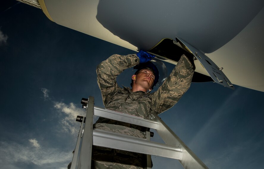 Senior Airman Jay O’Neil, 437th Aircraft Maintenance Squadron crew chief, performs the first recovery and maintenance checks on a new C-17 Globemaster III delivered May 30, 2013, to Joint Base Charleston – Air Base, S.C. The C-17 was piloted by Lt. Gen. Robert Allardice, Air Mobility Command vice commander. Joint Base Charleston is scheduled to receive the final C-17 later this year, as Boeing completes work on the Air Force’s last Globemaster. The first C-17 to enter the Air Force’s inventory arrived at Charleston Air Force Base in June 1993. The C-17 is capable of rapid strategic delivery of troops and all types of cargo to main operating bases or directly to forward bases in the deployment area. (U.S. Air Force photo/Senior Airman Dennis Sloan)