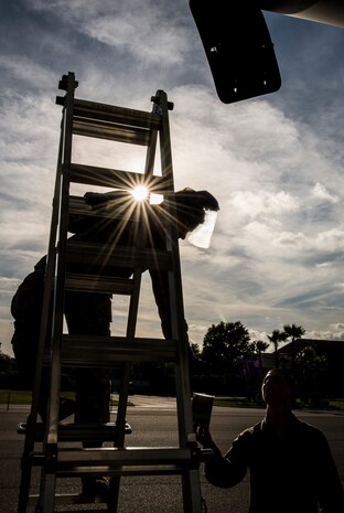 Senior Airman Jay O’Neil, and Airman 1st Class Matthew Taresh, 437th Aircraft Maintenance Squadron crew chiefs, perform the first recovery and maintenance checks on a new C-17 Globemaster III delivered May 30, 2013, to Joint Base Charleston – Air Base, S.C. The C-17 was piloted by Lt. Gen. Robert Allardice, Air Mobility Command vice commander. Joint Base Charleston is scheduled to receive the final C-17 later this year, as Boeing completes work on the Air Force’s last Globemaster. The first C-17 to enter the Air Force’s inventory arrived at Charleston Air Force Base in June 1993. The C-17 is capable of rapid strategic delivery of troops and all types of cargo to main operating bases or directly to forward bases in the deployment area. (U.S. Air Force photo/Senior Airman Dennis Sloan)
