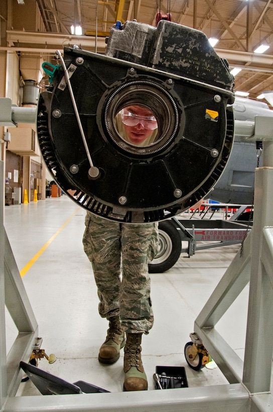 U.S. Air Force Airman Justin Baker, 361st Training Squadron, Aerospace Propulsion course, is installing a rear lip seal to the propeller of a T56 engine from an C-130 aircraft on May 20, 2013 at Sheppard Air Force Base, Texas. (U.S. Air Force photo by Frank Carter/Released)
