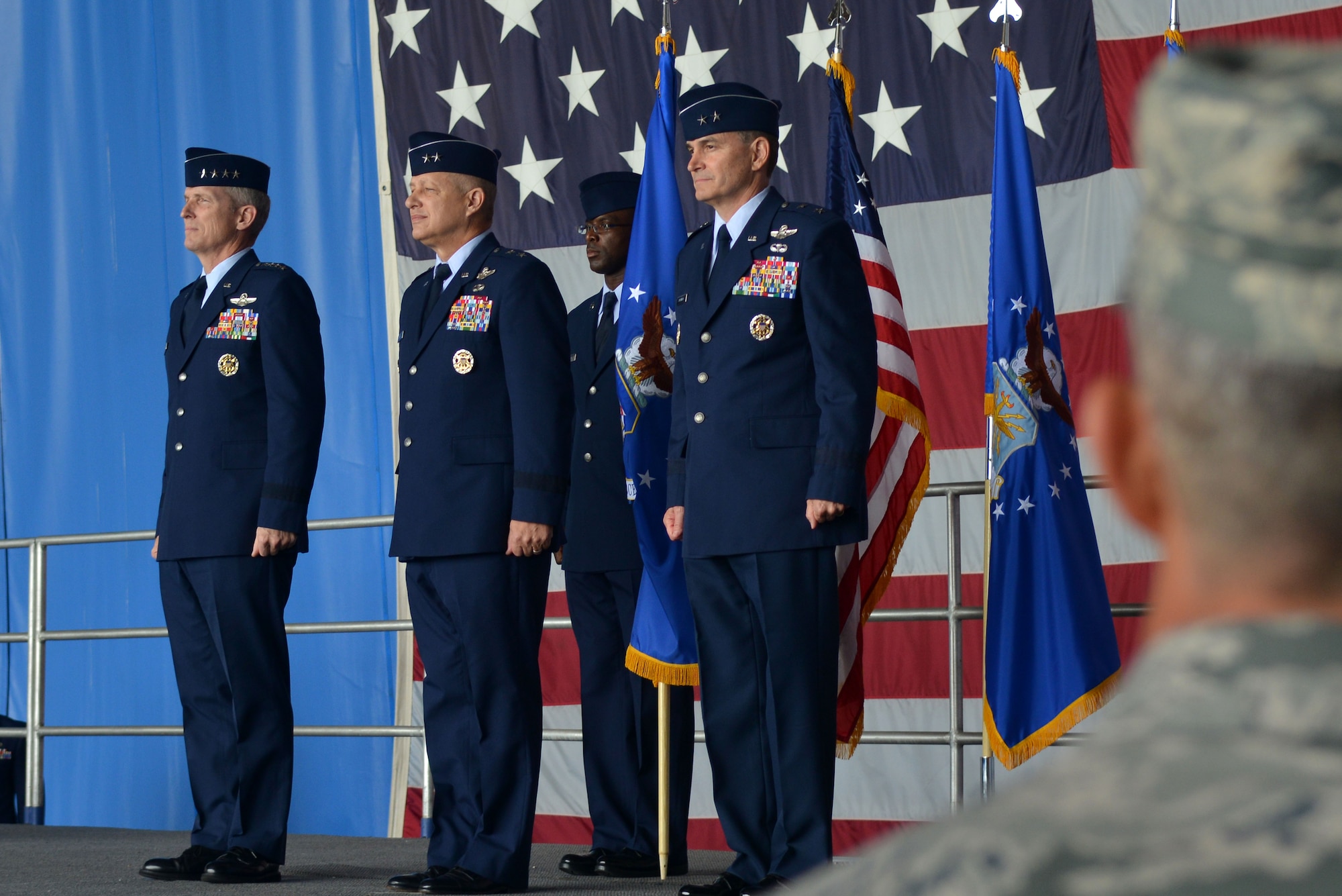 (From left) U.S. Air Force Gen. Mike Hostage, commander of Air Combat Command, Maj. Gen. Lawrence Wells, outgoing 9th Air Force commander, and Maj. Gen. Jake Polumbo, Jr., incoming 9th AF commander, participate in a change of command ceremony, Shaw Air Force Base, S.C., May 31, 2013. Hostage served as the presiding officer for the 9th Air Force change of command ceremony, which was followed by Wells’ retirement ceremony.  (U.S. Air Force photo by Airman 1st Class Ashley L. Gardner/Released)