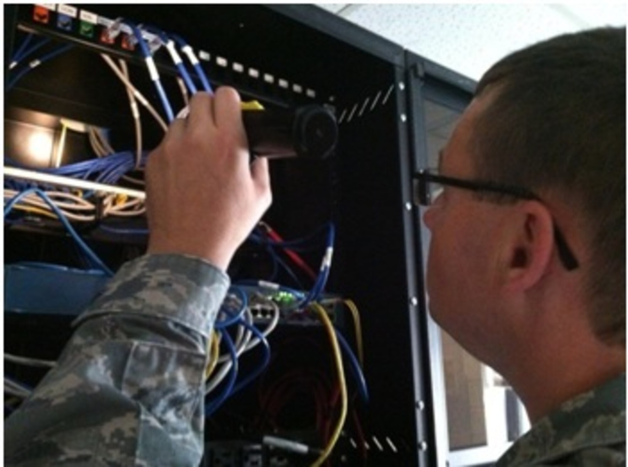 Tech. Sgt. Scott Berkemeier, 914th Communications Squadron, performs preventative maintenance actions during his team’s regular equipment inspections.  In preparation for the 914th Airlift Wing’s upcoming Consolidated Unit Inspection, 914 CS members performed regular Preventative Maintenance Inspections throughout the base during the June 2-3, 2013 unit training assembly.  These PMIs consist of inspecting for damage, proper grounding, and any other potential issues which may incur a communications outage.  (U.S. Air Force photo by Senior Airman Daniel Becker)