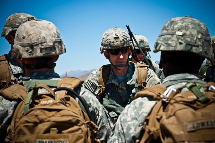 Maj Gen. John Nicholson , 82nd Airborne Division commanding general,  talks to his soldiers at a rally point May 31, 2013, during the Joint Forcible Entry Exercise on the Nevada Test and Training Range, Nev. JFEX is meant to evaluate mission leadership's ability to efficiently integrate ground forces and dissimilar aircraft to achieve strategic objectives. (U.S. Air Force photo by Staff Sgt. Michael Charles)