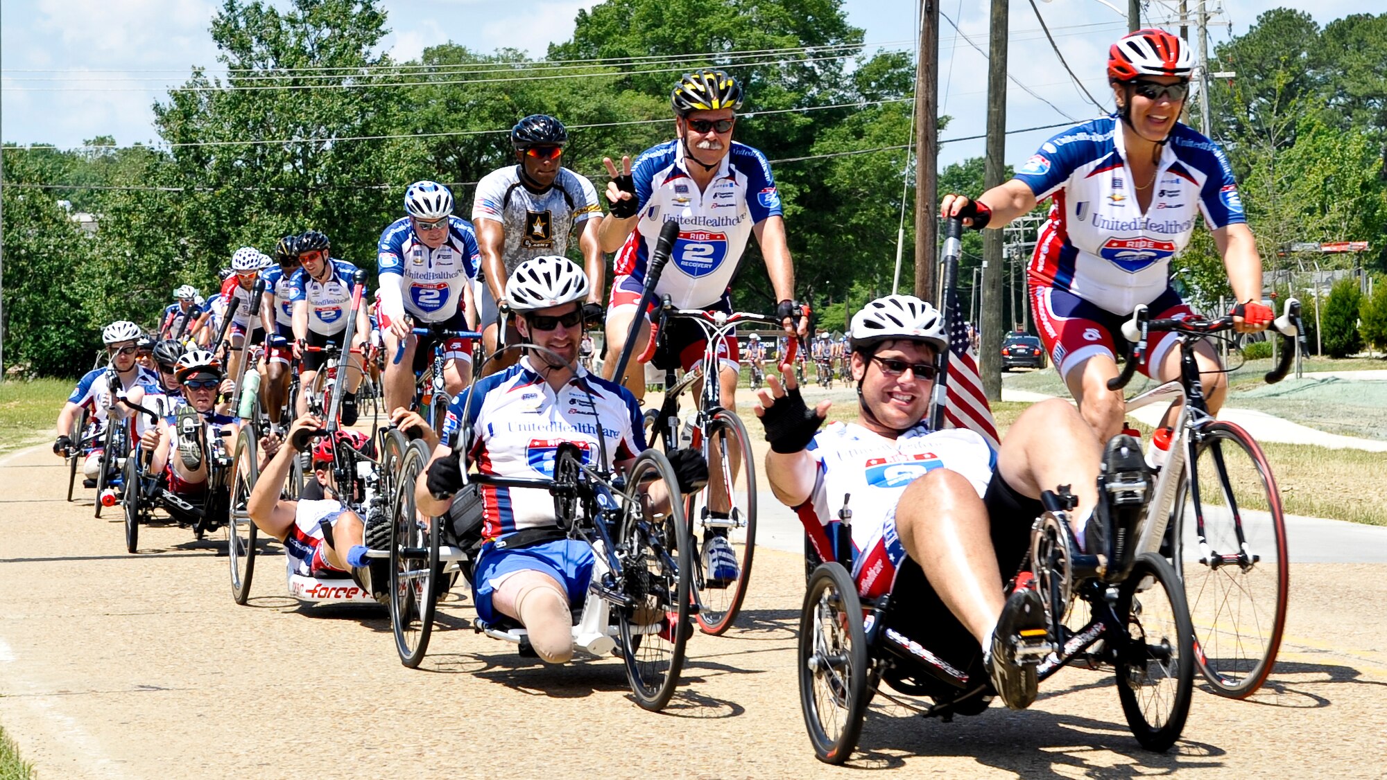 Approximately 200 Ride 2 Recovery cyclists ride around Fort Eustis, Va., May 31, 2013. The cyclists stopped at Fort Eustis during their multi-day ride from Washington, D.C. to Virginia Beach, Va. R2R helps injured veterans improve their health and wellness through cycling. (U.S. Air Force photo by Staff Sgt. Wesley Farnsworth / Released)  

