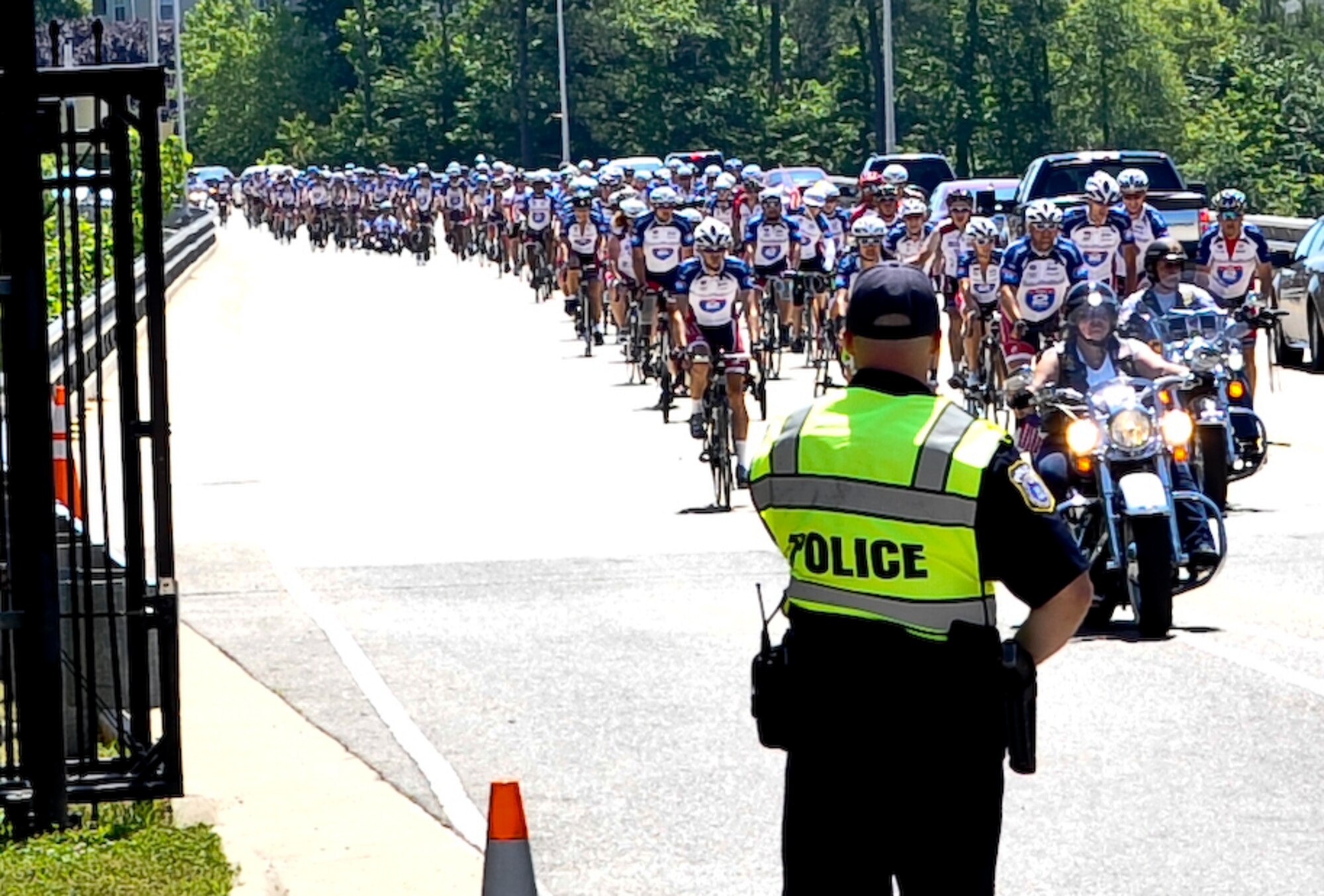 Approximately 200 Ride 2 Recovery cyclists arrive at Fort Eustis, Va., May 31, 2013. The cyclists stopped at Fort Eustis during their multi-day ride from Washington, D.C. to Virginia Beach, Va. R2R helps injured veterans improve their health and wellness through cycling. (U.S. Air Force photo by Staff Sgt. Wesley Farnsworth / Released)  