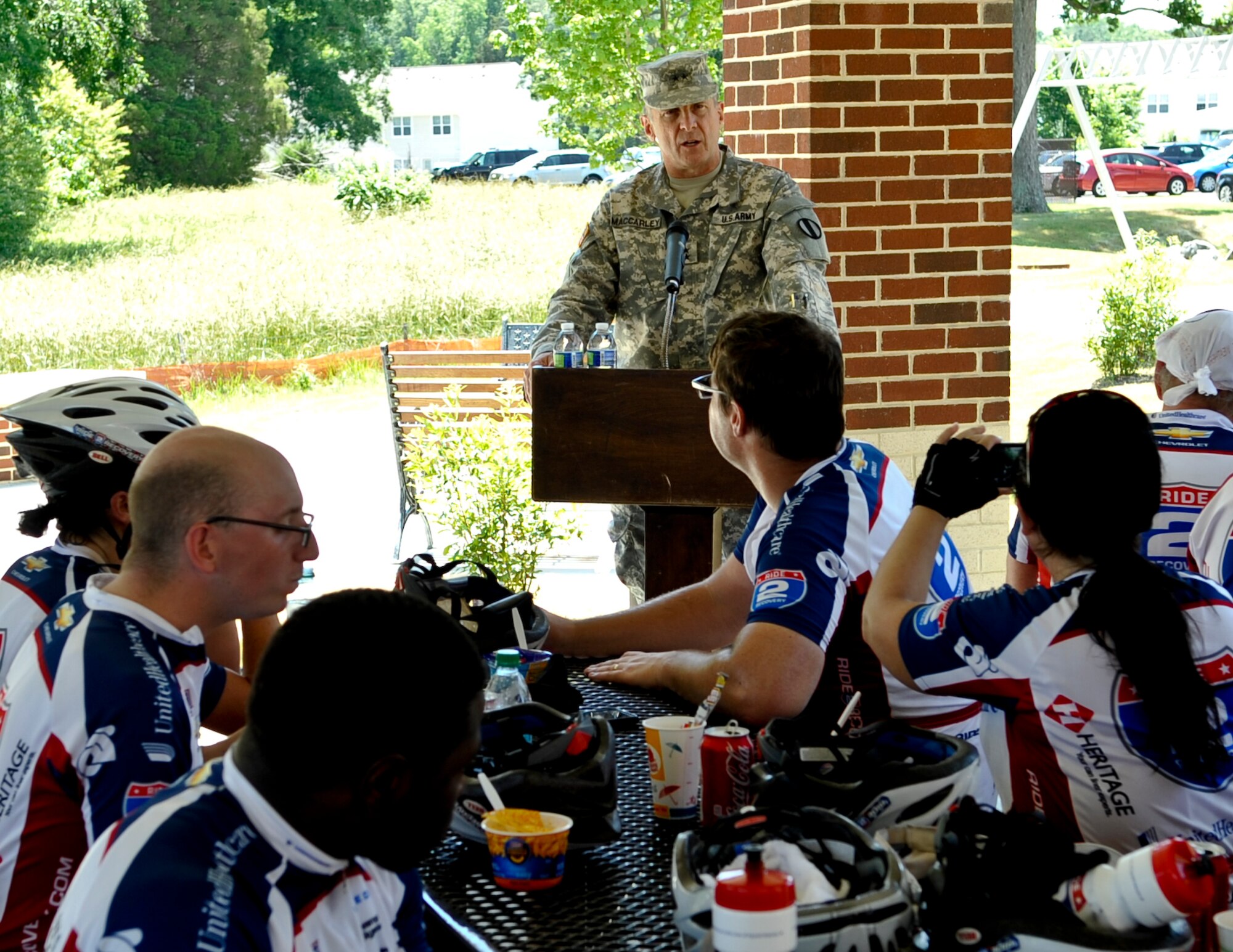 U.S. Army Maj. Gen. Mark MacCarley, U.S. Army Training and Doctrine Command deputy chief of staff, addresses 200 cyclists during a luncheon at the Warrior Transition Unit at Fort Eustis, Va., May 31, 2013. The cyclists were participating in a multi-day ride from Washington, D.C. to Virginia Beach, Va., as part of the injured veteran organization Ride 2 Recovery. (U.S. Air Force photo by Staff Sgt. Wesley Farnsworth / Released)  
