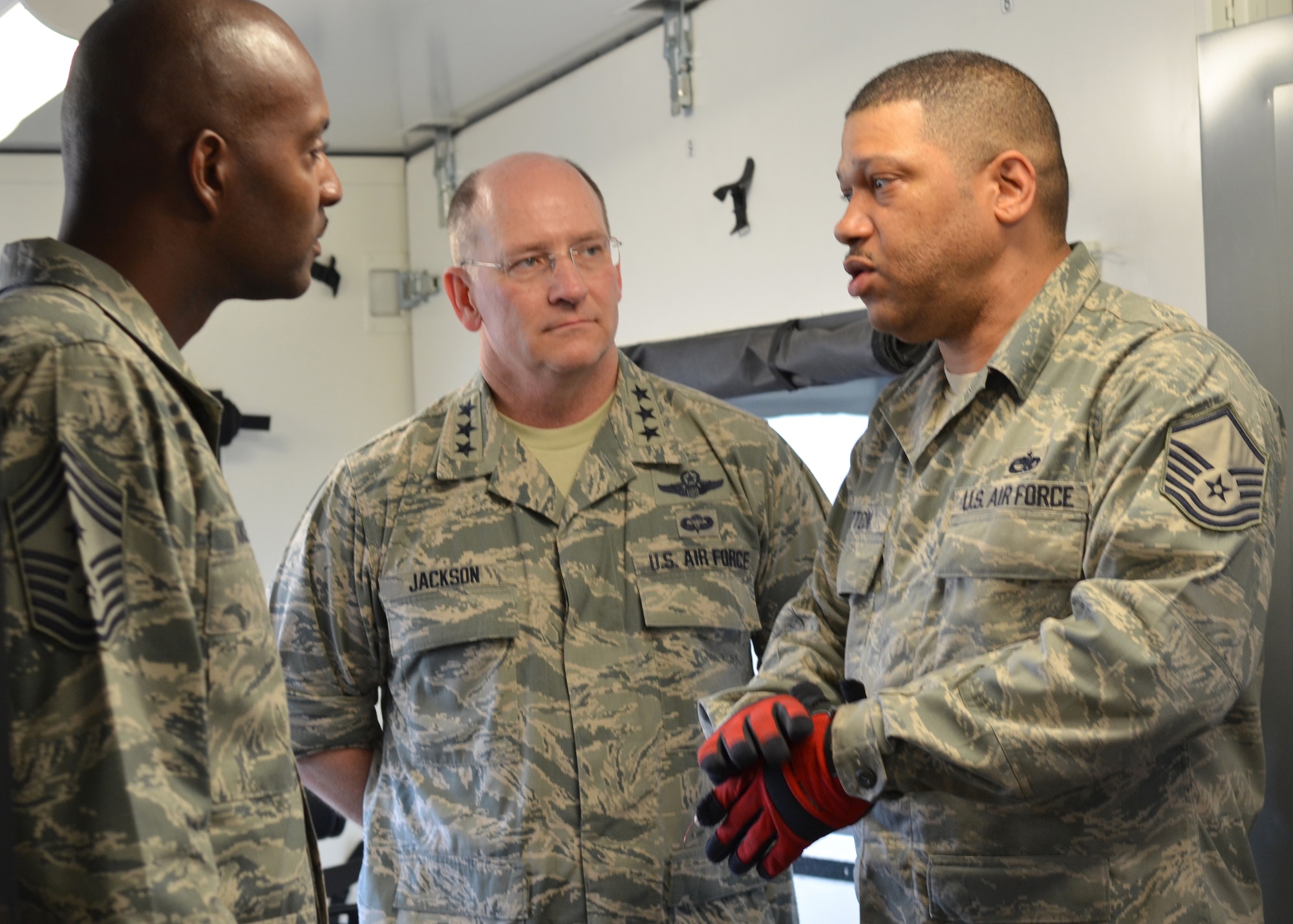 Master Sgt. Alexander Cotton, right, 439th Airlift Control Flight, explains
the ALCF mission to Lt. Gen. James Jackson, commander of the Air Force Reserve Command, and AFRC Command Chief Master Sgt. Cameron Kirksey June 2, 2013. The general and command chief toured Westover Air Reserve Base, Mass., June 1-2 and met the men and women of the command's 439th Airlift Wing, a unit-equipped C-5 Galaxy unit. (US Air Force photo/Senior Airman Kelly Galloway)
