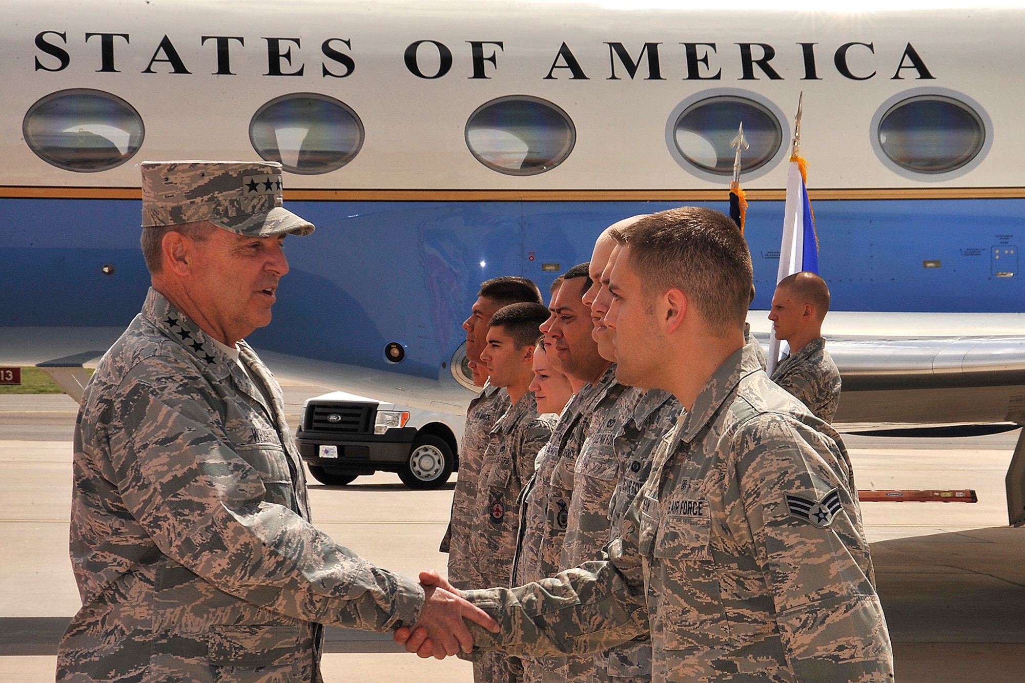 PETERSON AIR FORCE BASE, Colo. - Air Force Chief of Staff Gen. Mark A. Welsh III congratulates Senior Airman Nathaniel Pepin, 21st Aerospace Medicine Flight, following a re-enlistment ceremony here, May 28, 2013. (U.S. Air Force photo/Dennis Howk)