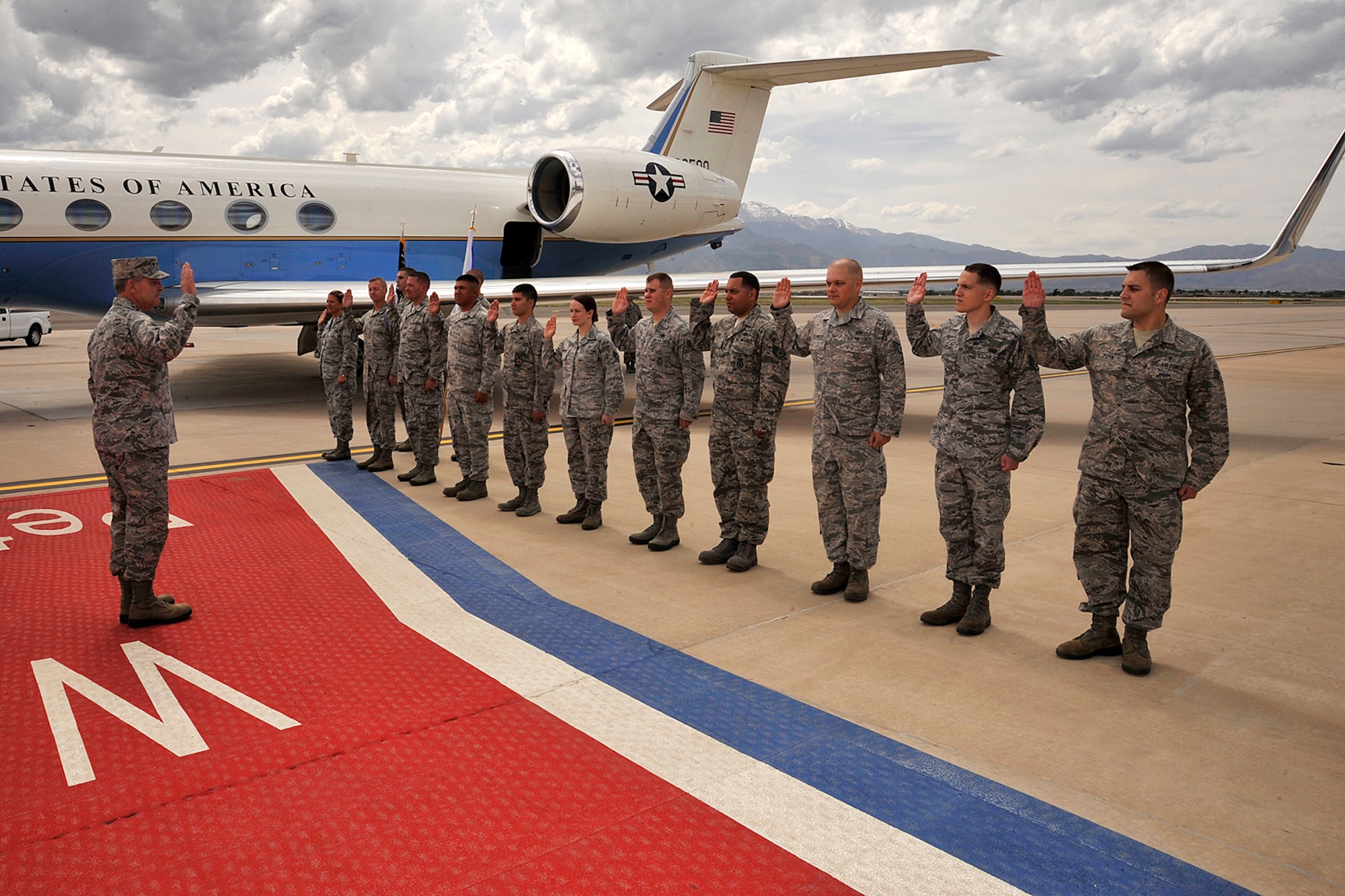 PETERSON AIR FORCE BASE, Colo. - Air Force Chief of Staff Gen. Mark A. Welsh III administers the oath of enlistment to Airmen from the U.S. Air Force Academy and Peterson and Buckley Air Force Bases during a ceremony on the flight line here, May 28, 2013. (U.S. Air Force photo/Dennis Howk)