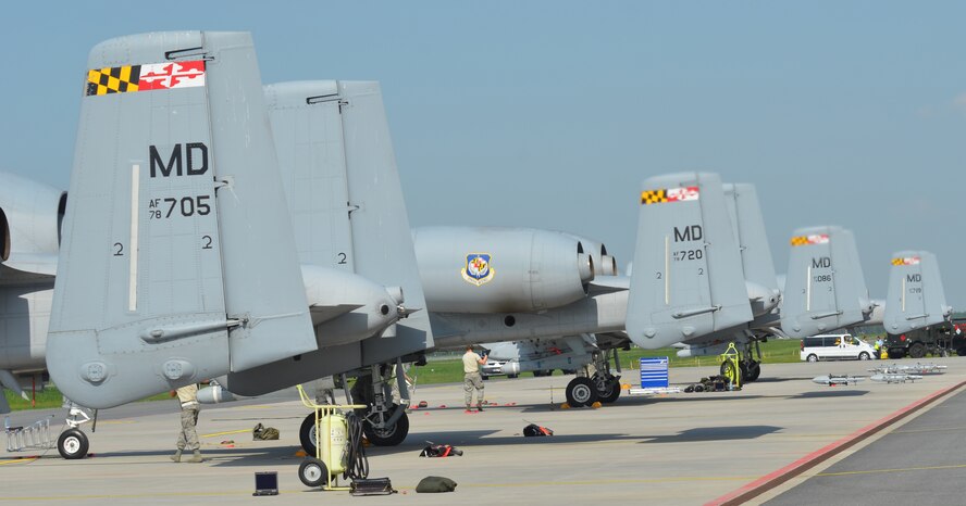 A-10C Thunderbolt II’s assigned to the 104th Fighter Squadron sit on the flightline after a training mission preparing for the start of Saber Strike at Amari Air Base, Estonia on June 2, 2013. The Maryland Air National Guard pilots will provide training and mentoring to the Estonian Air Force with their close air support aircraft. Saber Strike 2013 is a multinational exercise involving approximately 2,000 personnel from 14 countries and is designed to improve NATO interoperability and strengthen the relationships between military forces of the U.S., Estonia and other participating nations (U.S. Air National Guard photo by Capt. Joseph Winter)