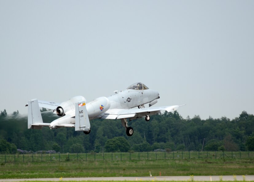 An A-10C Thunderbolt II assigned to the 104th Fighter Squadron takes off for a familiarization flight before the start of Saber Strike from Amari Air Base, Estonia on June 2, 2013. The Maryland Air National Guard pilots will provide training and mentoring to the Estonian Air Force with their close air support aircraft. Saber Strike 2013 is a multinational exercise involving approximately 2,000 personnel from 14 countries and is designed to improve NATO interoperability and strengthen the relationships between military forces of the U.S., Estonia and other participating nations (U.S. Air National Guard photo by Capt. Joseph Winter)