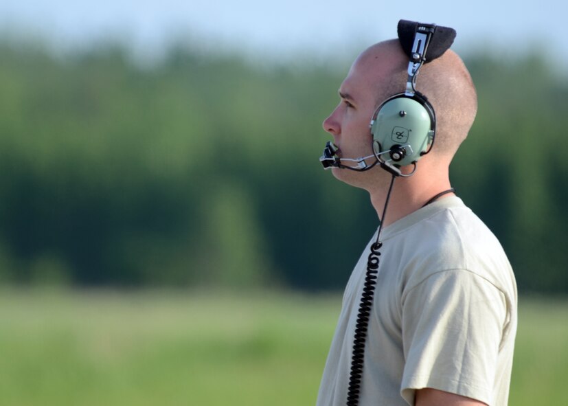 U.S. Air Force Senior Airman Bryan Sieling, a crew chief assigned to 175th Aircraft Maintenance Squadron, Maryland Air National Guard, prepares to launch an A-10C Thunderbolt II for a training mission before the start of Saber Strike at Amari Air Base, Estonia on June 2, 2013. Saber Strike 2013 is a multinational exercise involving approximately 2,000 personnel from 14 countries and is designed to improve NATO interoperability and strengthen the relationships between military forces of the U.S., Estonia and other participating nations. (U.S. Air National Guard photo by Staff Sgt. Benjamin Hughes)