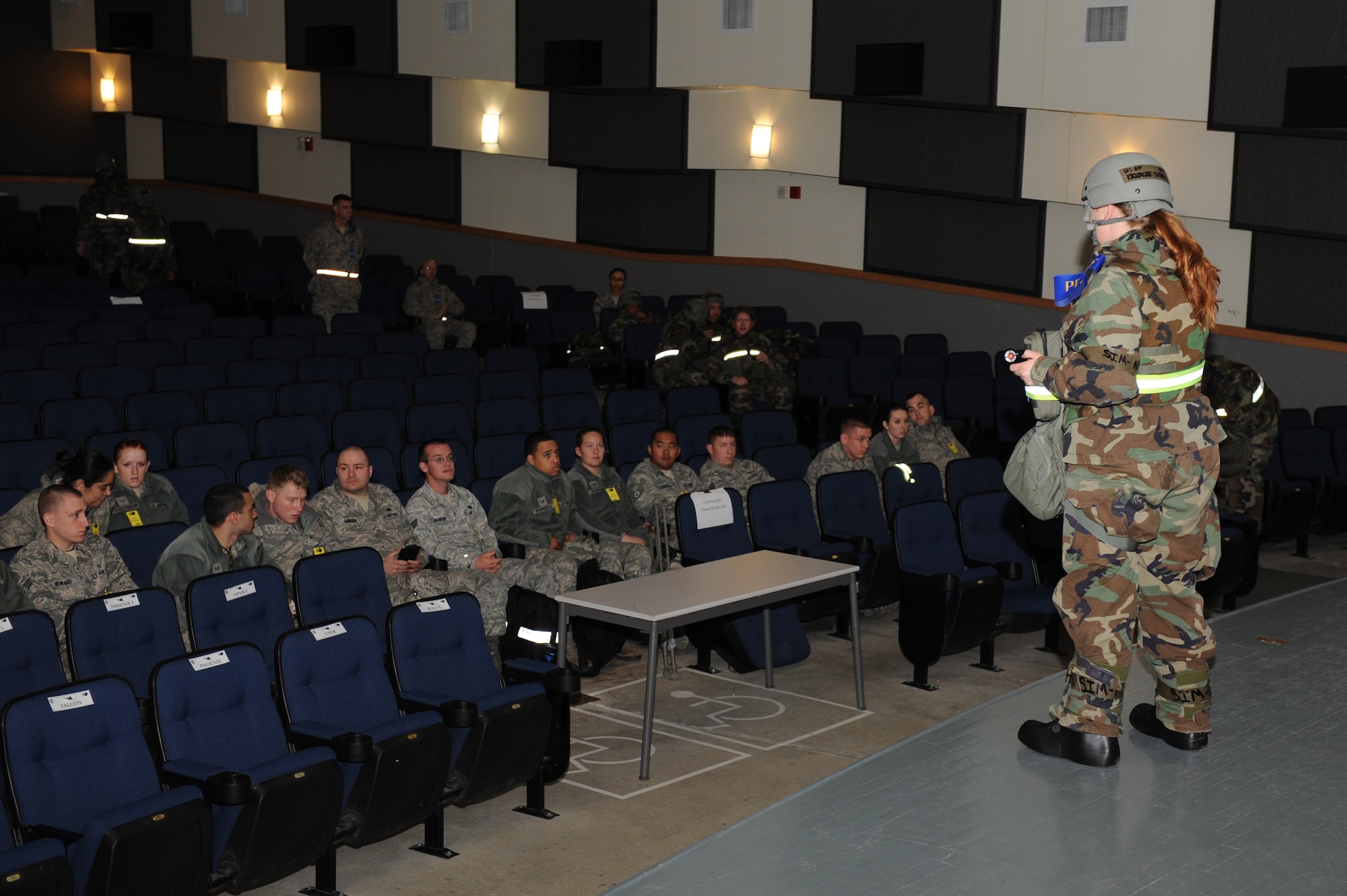 Staff Sgt. Kristie Stefinsky, 8th Force Support Squadron personnel deployment reception function member, briefs follow-on forces role-players regarding emergency procedures during exercise Beverly Bearcat 13-01 at Kunsan Air Base, Republic of Korea, April 8, 2013. The 8th Fighter Wing role-players represented military members who would deploy  into Kunsan from across the Air Force to augment the base’s mission. (U.S. Air Force photo by Staff Sgt. Jonathan Fowler/Released)