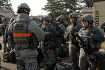 1st Lt. Jonathan Read, 8th Security Forces Squadron, briefs his flight on duty locations during an Operational Readiness Inspection at Kunsan Air Base, Republic of Korea, April 8, 2013. ORIs are conducted to evaluate and measure the ability of a unit to perform its mission. (U.S. Air Force photo by Senior Airman Marcus Morris/Released)