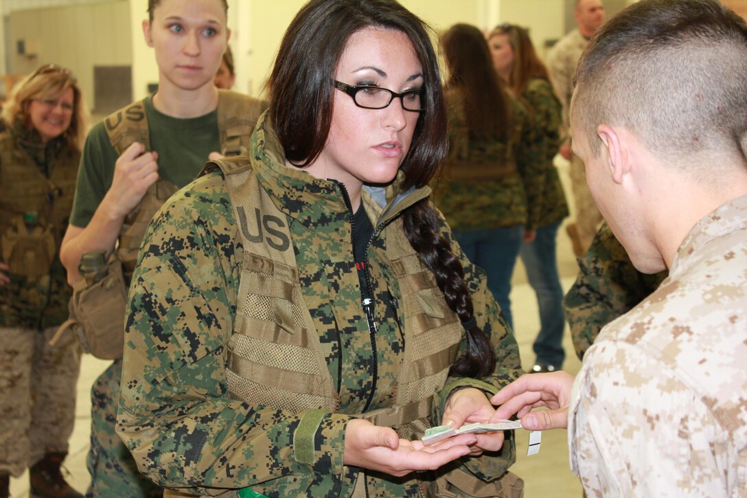 Spouses learn about how the Marine Corps trains for chemical weapons. 